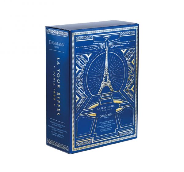 Un coffret de 3 thés aromatisés, d'un thé noir et d'une infusion de la marque Dammann présentés dans un joli coffret bleu nuit avec pour décor la Tour Eiffel étincelante d'or